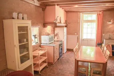 Cuisine ou kitchenette dans l'établissement Maison Blanche