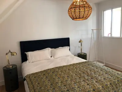 Un ou plusieurs lits dans un hébergement de l'établissement Le Loft Deveney-Mars