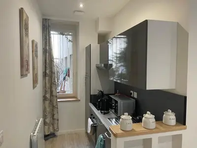 Cuisine ou kitchenette dans l'établissement Maponi