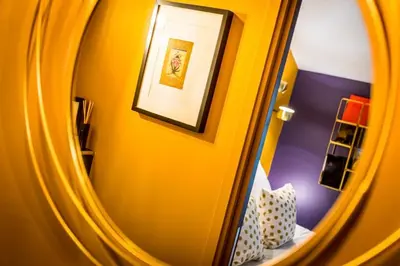 Un ou plusieurs lits dans un hébergement de l'établissement Hôtel - Restaurant Le Globe