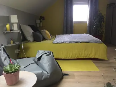 Un ou plusieurs lits dans un hébergement de l'établissement Maison à la Campagne à 2km du Circuit de Bresse