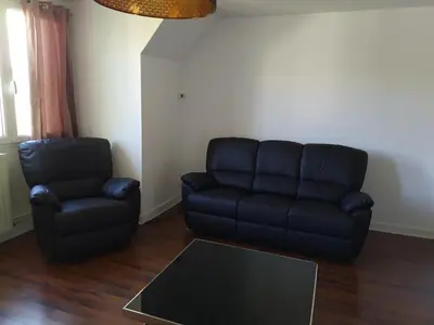 Coin salon dans l'établissement Bel appartement en plein coeur de ville
