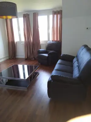 Coin salon dans l'établissement Bel appartement en plein coeur de ville