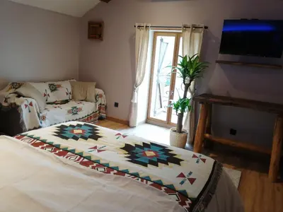 Un ou plusieurs lits dans un hébergement de l'établissement Gîte Les Hauts de Morey - Aux Amoureuses