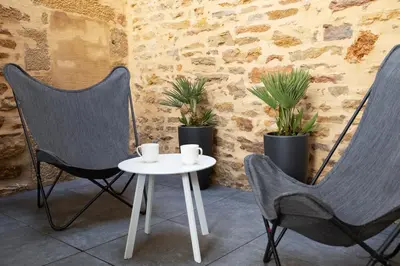Coin salon dans l'établissement Maison Tillot