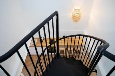 Un ou plusieurs lits dans un hébergement de l'établissement Maison Tillot
