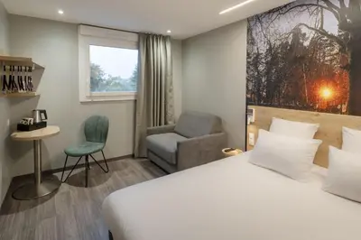 Un ou plusieurs lits dans un hébergement de l'établissement Sure Hotel by Best Western Dole