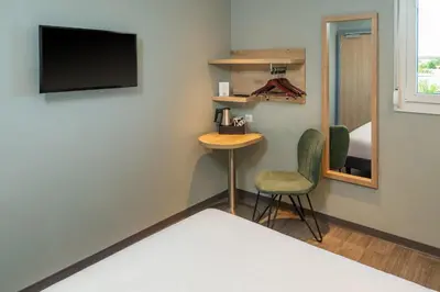 Un ou plusieurs lits dans un hébergement de l'établissement Sure Hotel by Best Western Dole
