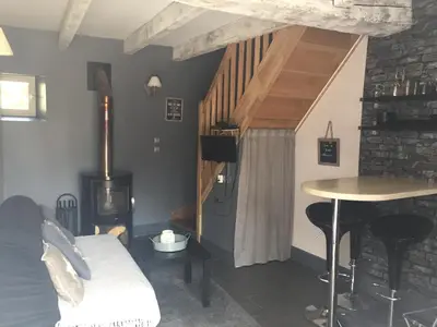 Coin salon dans l'établissement Le Gite du Petit Lavoir