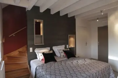 Un ou plusieurs lits dans un hébergement de l'établissement Hostellerie Saint Germain