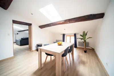 Coin salon dans l'établissement Myappart71 - Appartement - cosy au centre ville