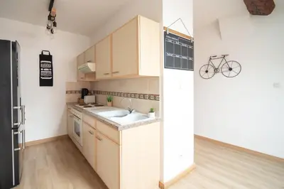 Cuisine ou kitchenette dans l'établissement Myappart71 - Appartement - cosy au centre ville