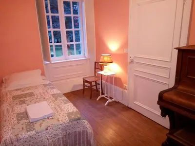 Un ou plusieurs lits dans un hébergement de l'établissement Maison de caractere