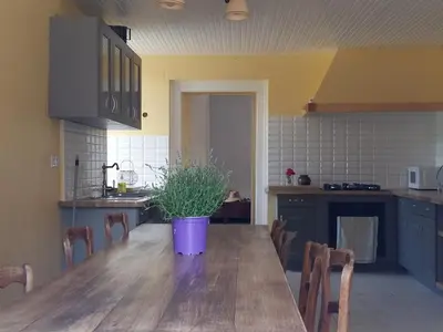 Cuisine ou kitchenette dans l'établissement Maison de caractere