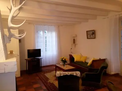 Télévision ou salle de divertissement dans l'établissement Maison de caractere