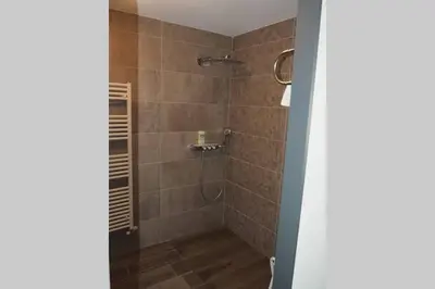 Salle de bains dans l'établissement Le Clos des Jardins