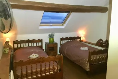 Un ou plusieurs lits dans un hébergement de l'établissement Manoir BnBurgundy