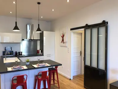 Cuisine ou kitchenette dans l'établissement La Renaissance au coeur du centre historique
