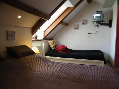 Un ou plusieurs lits dans un hébergement de l'établissement Datcha Bourguignonne, Chambres & Gîte