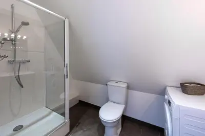 Salle de bains dans l'établissement Le Palais