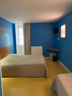 Un ou plusieurs lits dans un hébergement de l'établissement L'ETAPE DE SANTENAY
