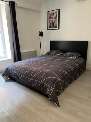 Un ou plusieurs lits dans un hébergement de l'établissement Myappart71 - Studio - cosy au centre ville