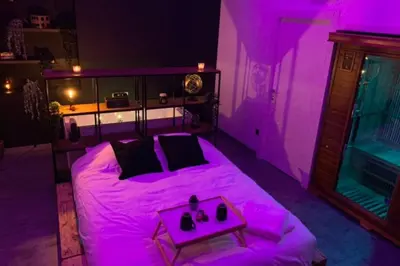 Un ou plusieurs lits dans un hébergement de l'établissement Appartement Spa - NAHLEO Industriel