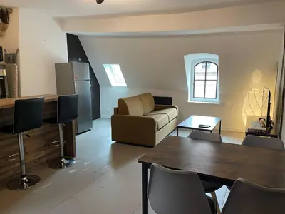 Coin salon dans l'établissement Appartements chez Delphine et Guillaume au coeur de Semur en Auxois