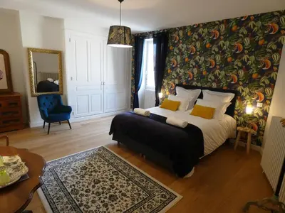 Un ou plusieurs lits dans un hébergement de l'établissement Le Clos De Quintaine Chambres d'Hôtes