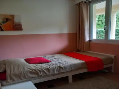 Un ou plusieurs lits dans un hébergement de l'établissement Burgundy Poolside Getaway