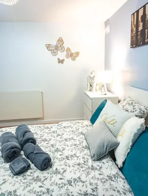 Un ou plusieurs lits dans un hébergement de l'établissement Le Flav - Charmant appartement à 10 mn de Dijon