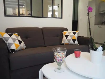 Coin salon dans l'établissement Le Millotet - Agréable studio à 2 mn Dijon Gare