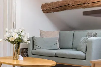 Coin salon dans l'établissement Le Vannerie - Appartement cœur historique - Tout équipé
