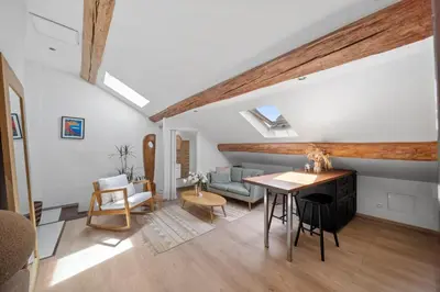 Coin salon dans l'établissement Le Vannerie - Appartement cœur historique - Tout équipé