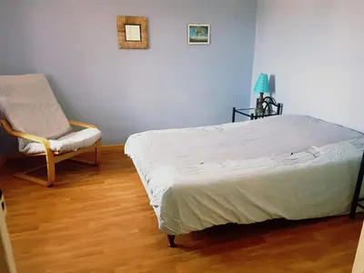 Un ou plusieurs lits dans un hébergement de l'établissement Gîte cosy 4 à 9 personnes