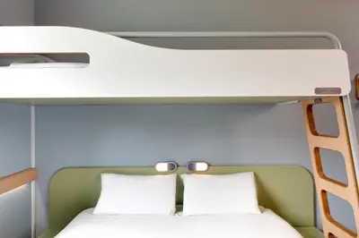 Un ou plusieurs lits dans un hébergement de l'établissement ibis budget Montceau les Mines