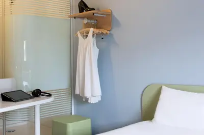 Un ou plusieurs lits dans un hébergement de l'établissement ibis budget Montceau les Mines