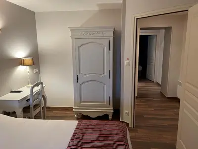 Un ou plusieurs lits dans un hébergement de l'établissement Hotel Village Motel