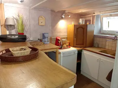 Cuisine ou kitchenette dans l'établissement Appartement dans le Morvan 16 min de l'autoroute