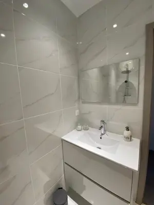 Salle de bains dans l'établissement Le Nid du Faubourg