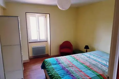 Un ou plusieurs lits dans un hébergement de l'établissement Gîte cosy 2 à 5 personnes