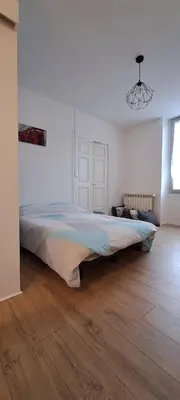 Un ou plusieurs lits dans un hébergement de l'établissement Appartement confort deux Etoiles