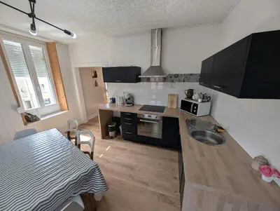 Cuisine ou kitchenette dans l'établissement Charmant duplex 100m2