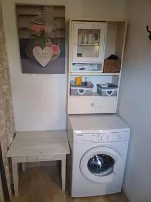 Cuisine ou kitchenette dans l'établissement Le Clos des Lavandes