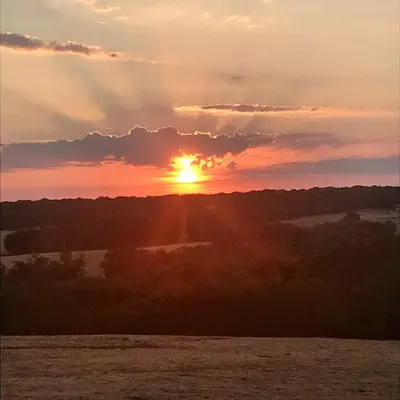 Lever ou coucher de soleil vu de la maison de vacances ou à proximité