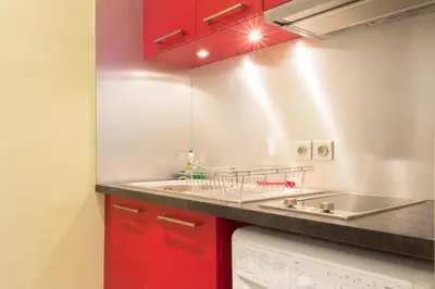 Cuisine ou kitchenette dans l'établissement Appartement - Petit Buffon