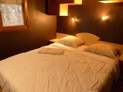 Un ou plusieurs lits dans un hébergement de l'établissement La Maison Blanche