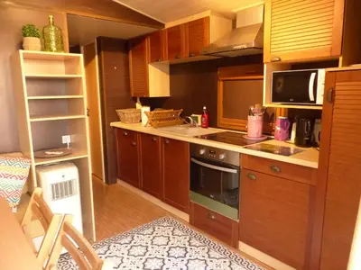 Cuisine ou kitchenette dans l'établissement La Maison Blanche