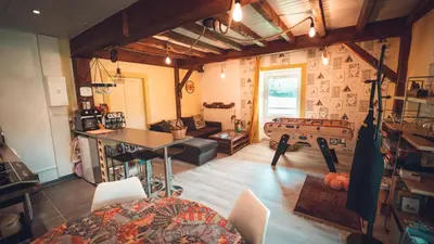 Coin salon dans l'établissement GITE COEUR DE NATURE