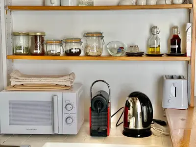 Cuisine ou kitchenette dans l'établissement Grand Cru, Appartement au Centre Médiéval de Beaune
